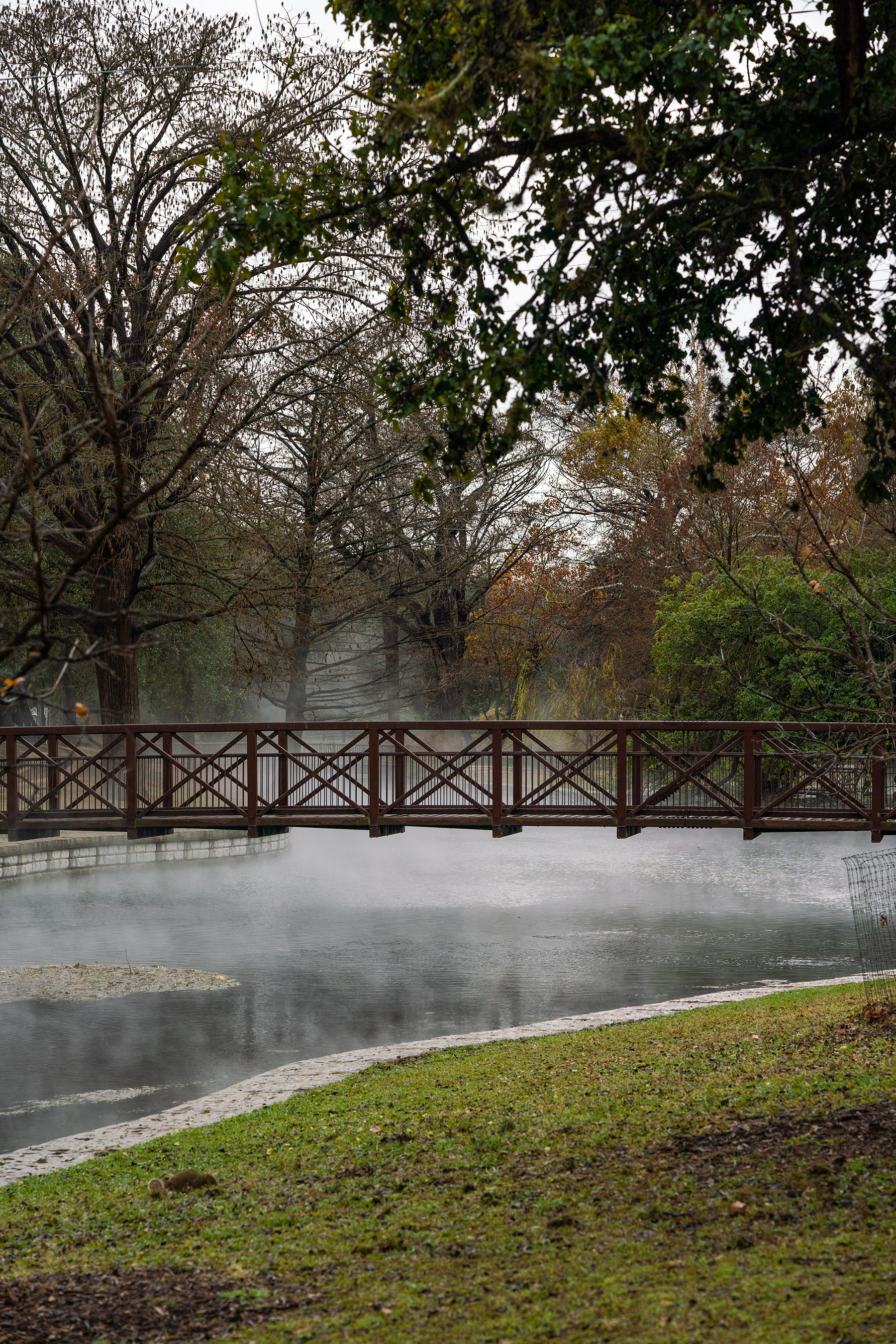 The 72 degree spring-fed lake creates steam on a wintery day. New Braunfels boasts over 550 acres of parks and green space for outdoor recreation.