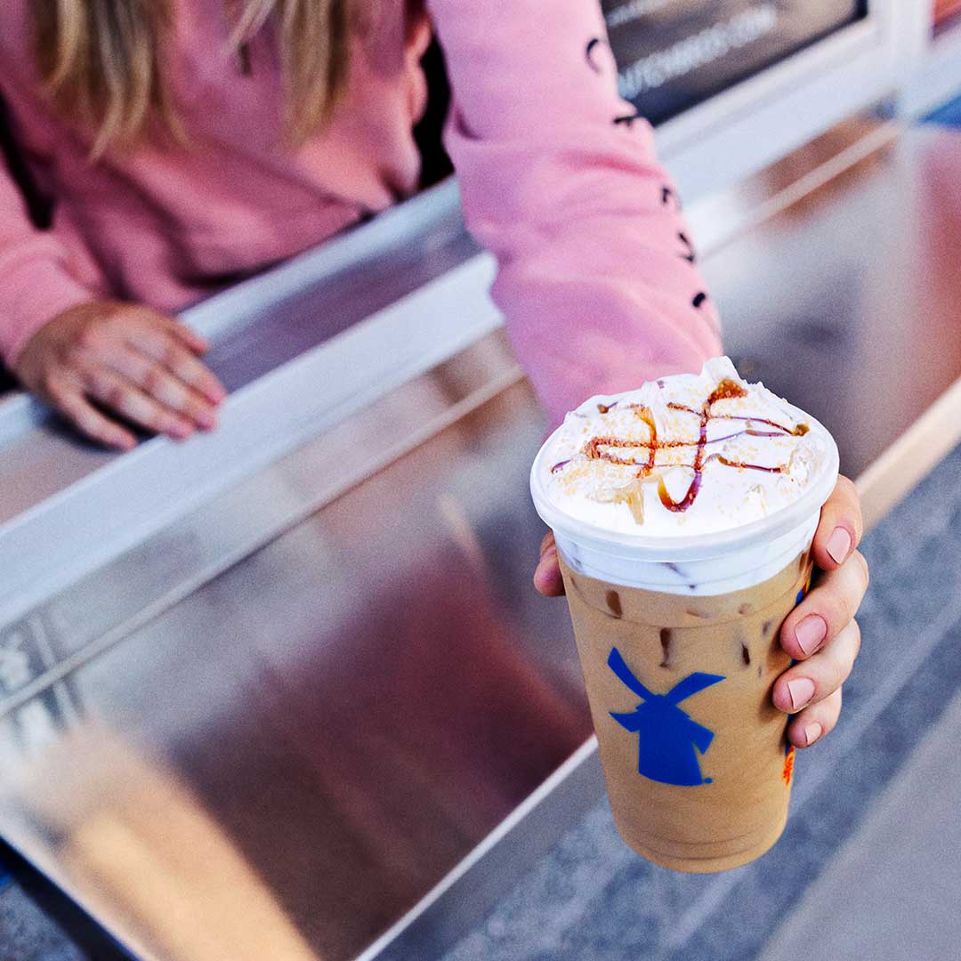 Drink in the fall vibes with pumpkin and salted caramel flavors topped with pumpkin drizzle, raw sugar sprinkles and Dutch Bros signature Soft Top.