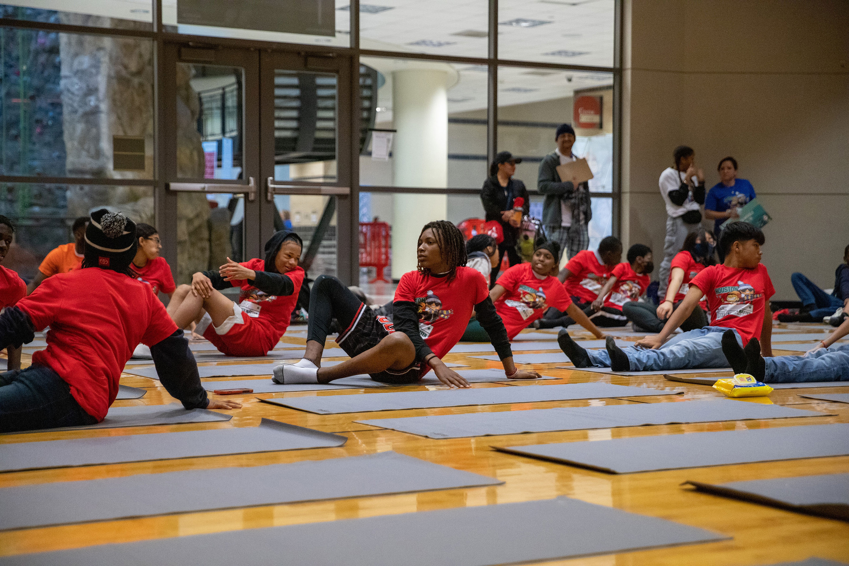 Athletes participate in yoga activity at Sports Matter Day Houston