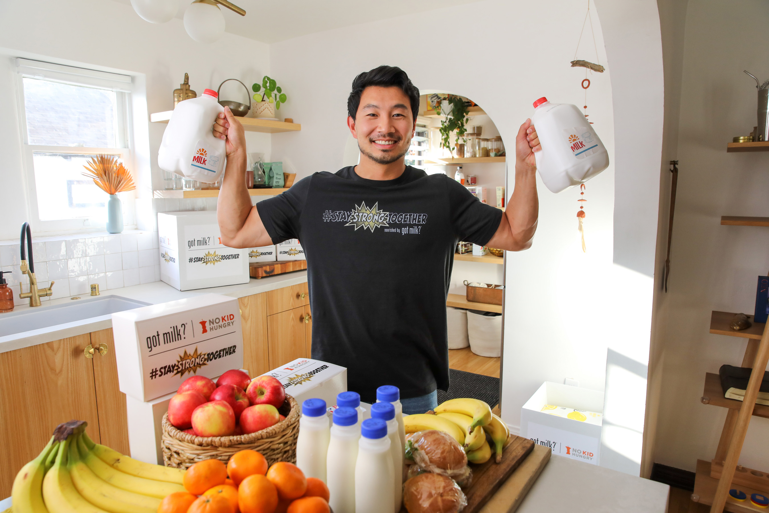 Marvel ‘Shang Chi’ Super Hero, Simu Liu, goes behind-the-scenes with the creators of ‘got milk?’ to demonstrates his own strength while inspiring others to give back. The #StayStrongTogether social media challenge marks a partnership between between California Milk Processor Board and No Kid Hungry to help provide up to 1 million meals to school feeding programs throughout the Golden State. (Photo by Rachel Murray Framingheddu for CMPB/Getty Images).