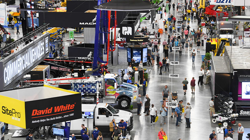 Attendees walk the West Hall exhibit floor at the 2021 World of Concrete 