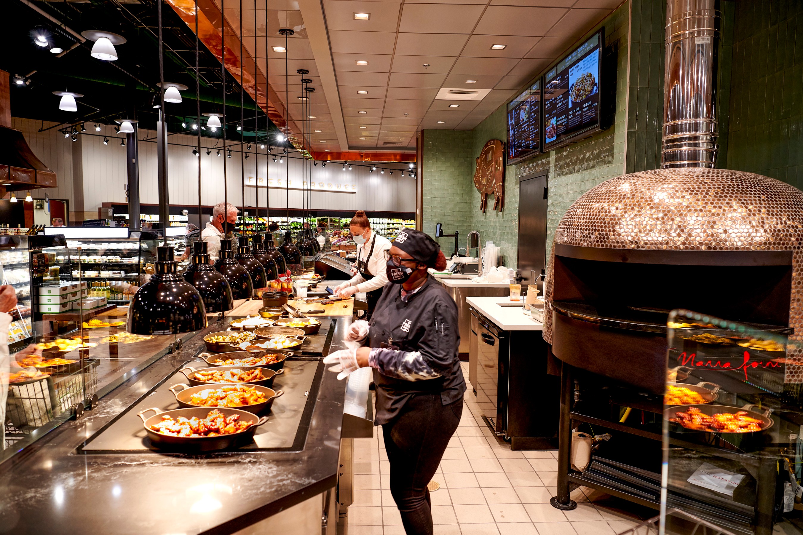 Smoked-in-house BBQ and Brick Oven Pizzas are on the menu at The Fresh Market, 3712 Lawndale in Greensboro, NC.