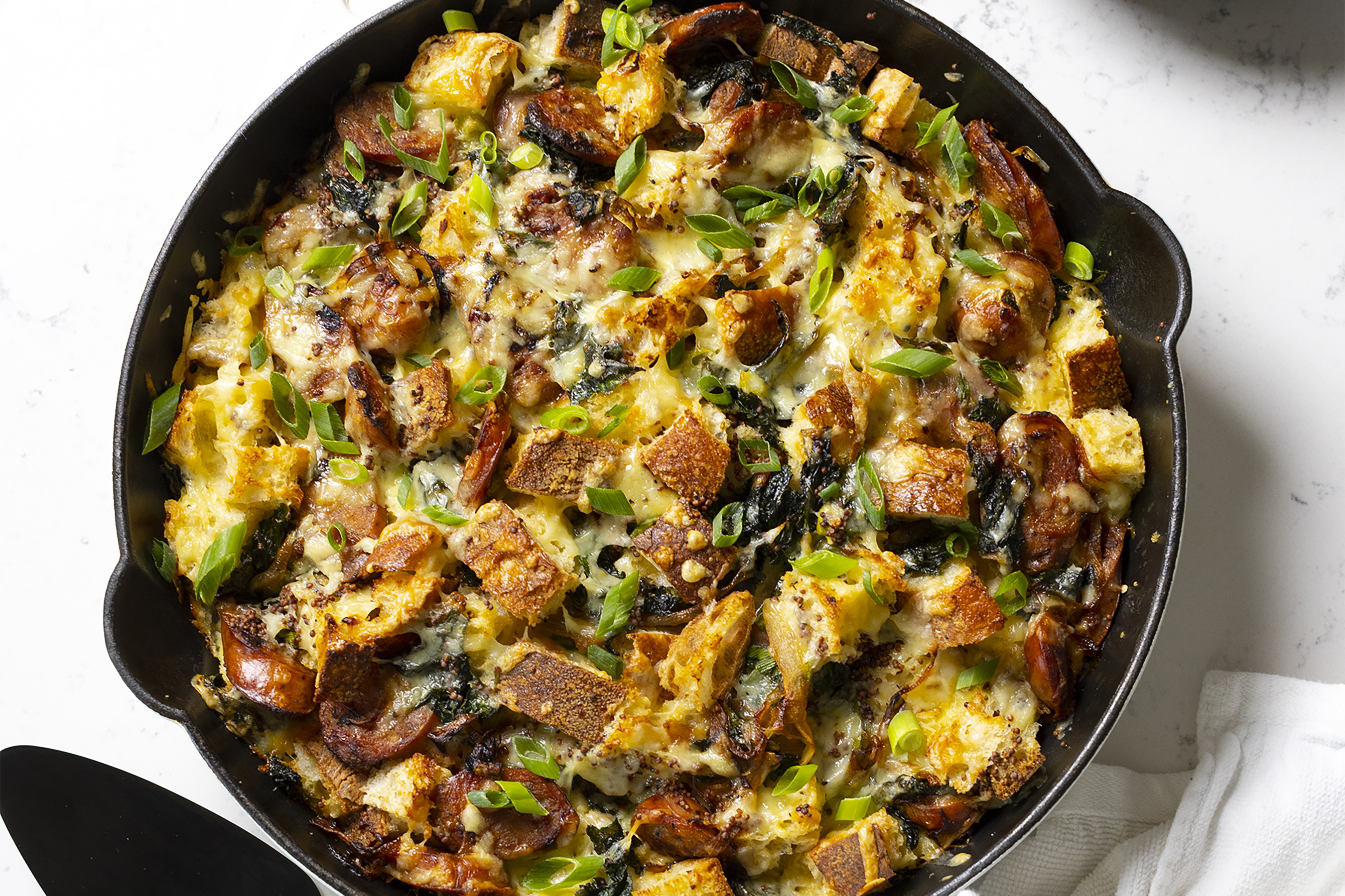 Cheesy Kale and Apple Sausage Strata