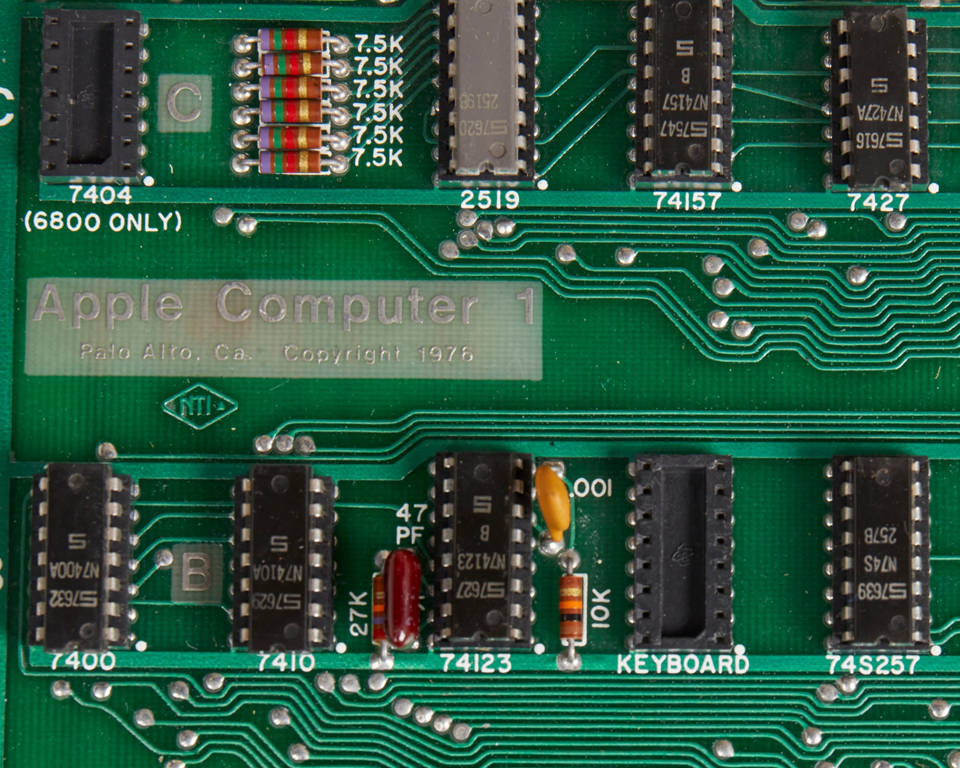 Detailed view of the hand-built motherboard of "The Chaffey College Apple-1" offered by Moran's.