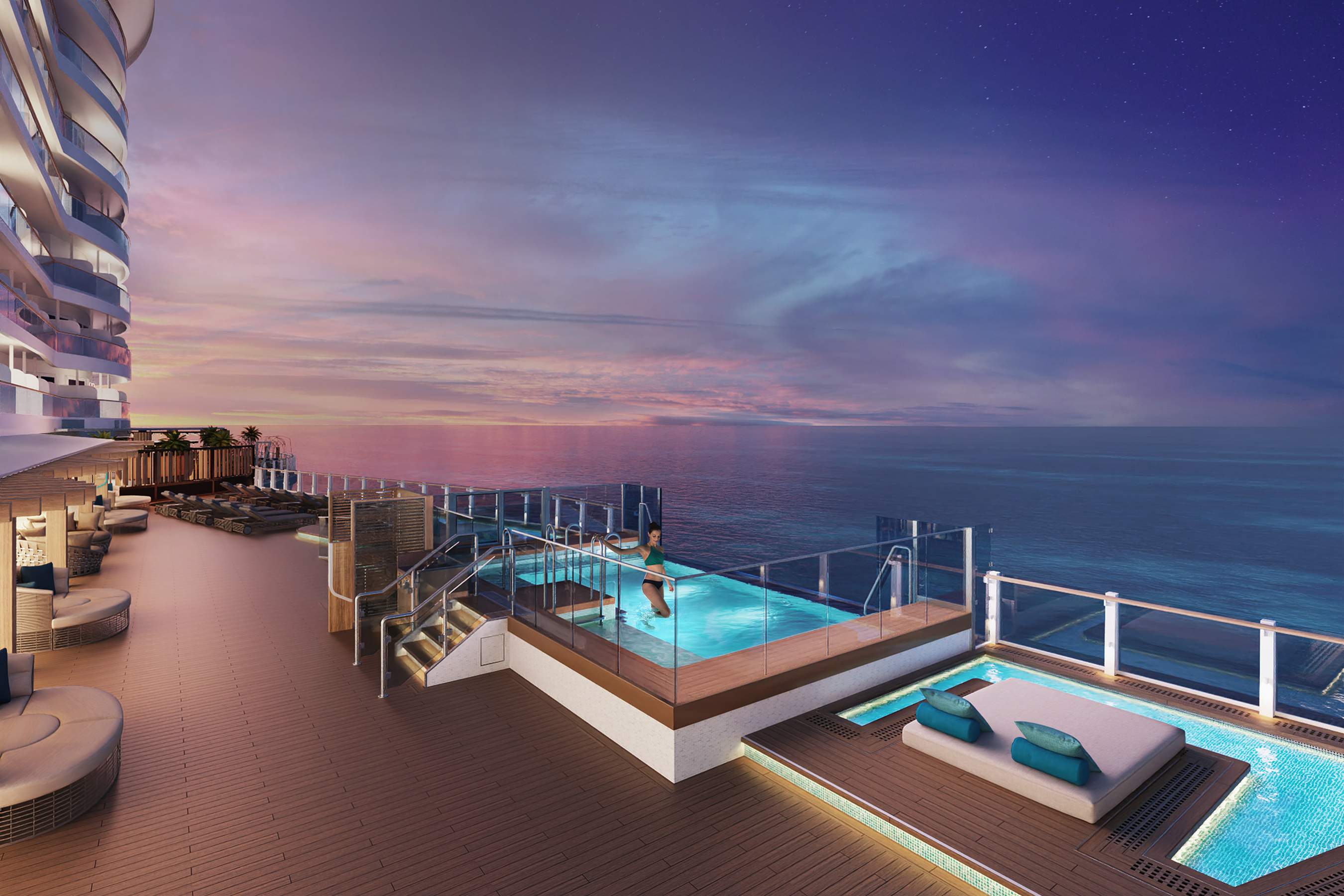 Guests can relax and enjoy the stunning views on the expansive pool decks at Infinity Beach on Norwegian Viva.