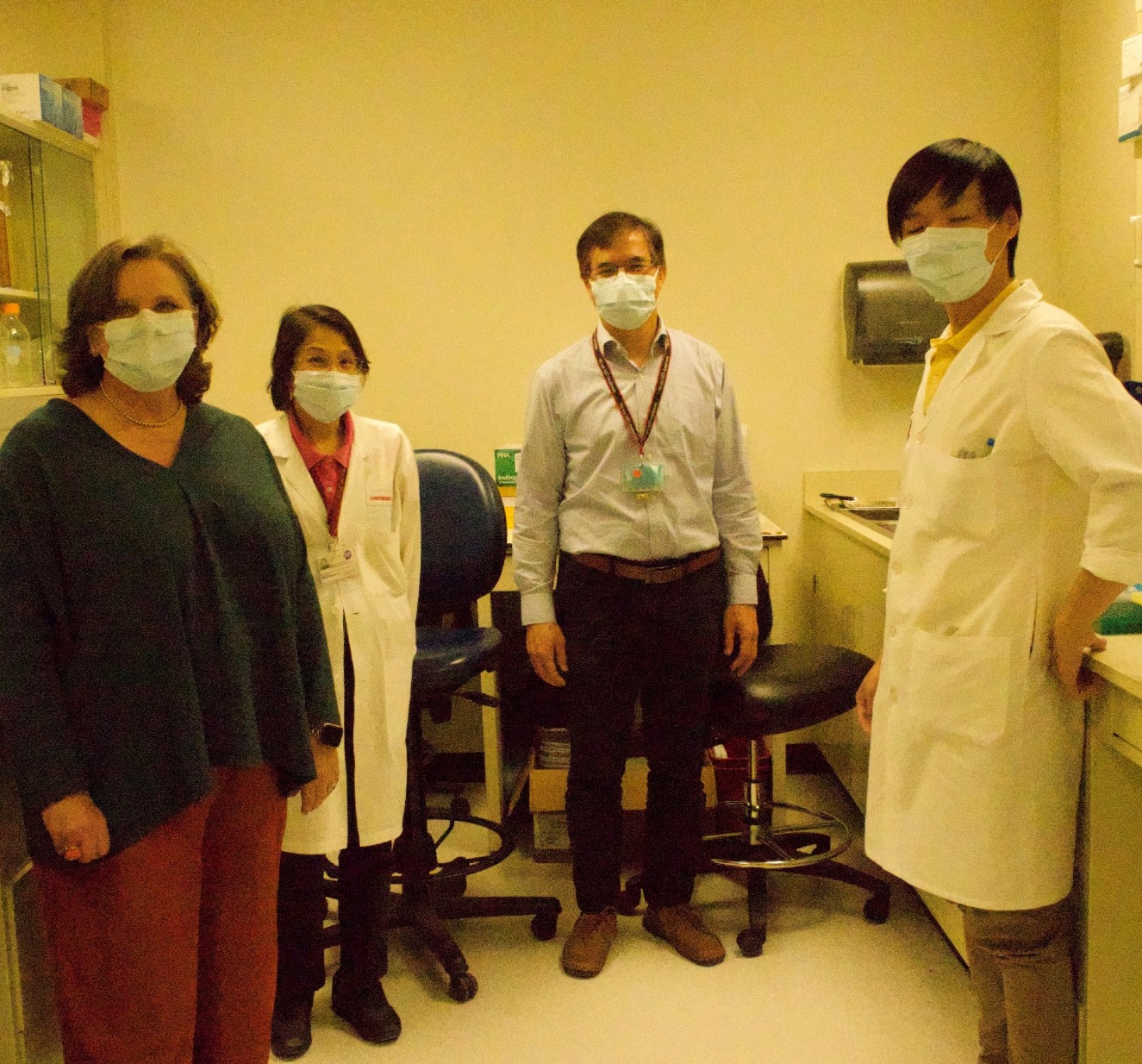 Nicole Andrews with Kwong K. Wong, Ph.D., professor of Gynecologic Oncology and Reproductive Medicine at The University of Texas MD Anderson Cancer Center, and his team in his lab