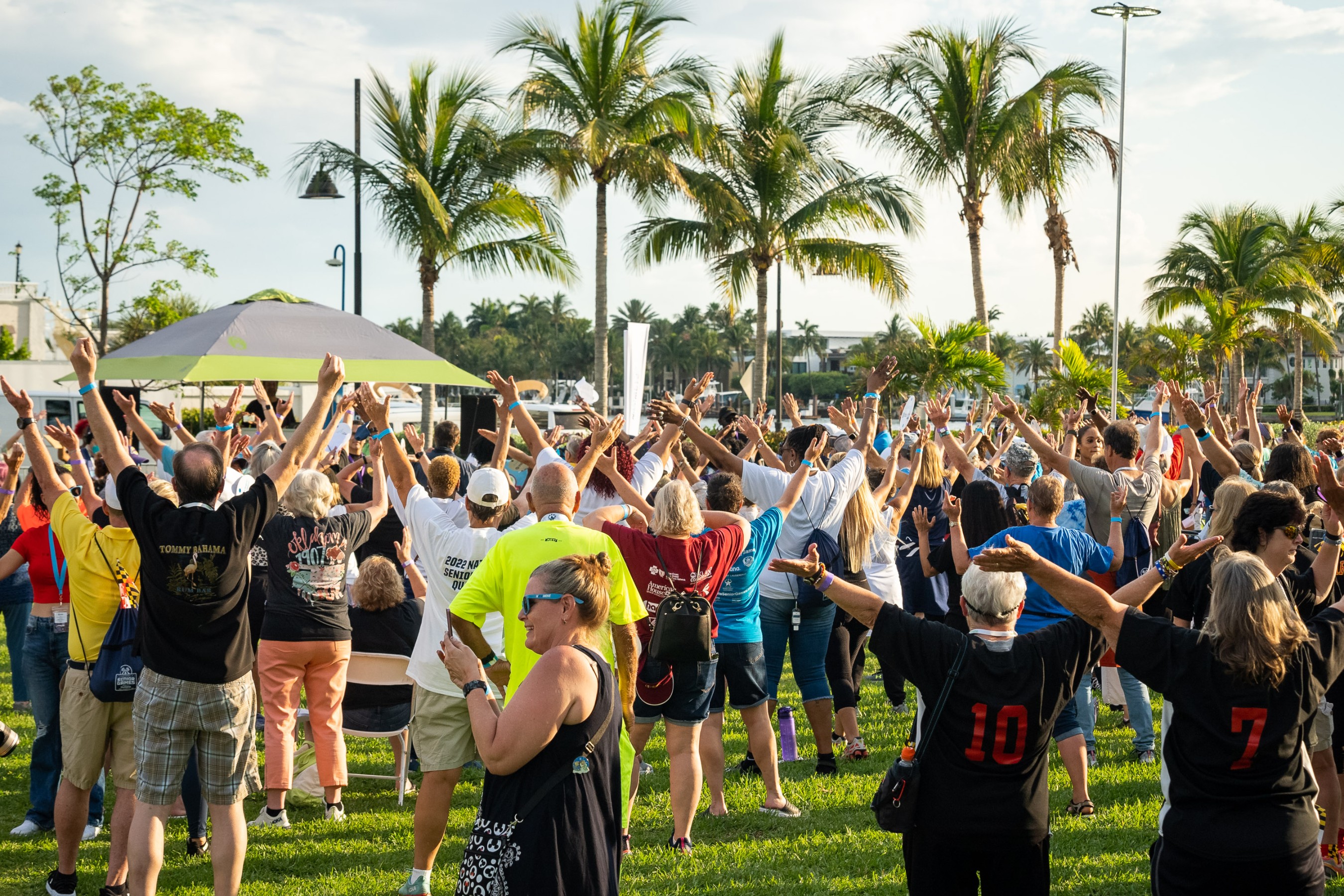 Participants compete in the GUINNESS WORLD RECORDS™ attempt for the Largest Game of Freeze Dance, sponsored by Pacira BioSciences, Inc. during the 2022 National Senior Games in Fort Lauderdale, Florida