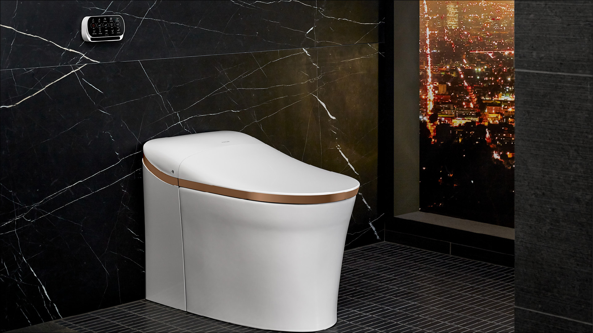 The Eir Intelligent toilet boasts a modern design softened by gentle curves and sloping profile. An optional decorative metal ring around the lid offers a unique finish accent.