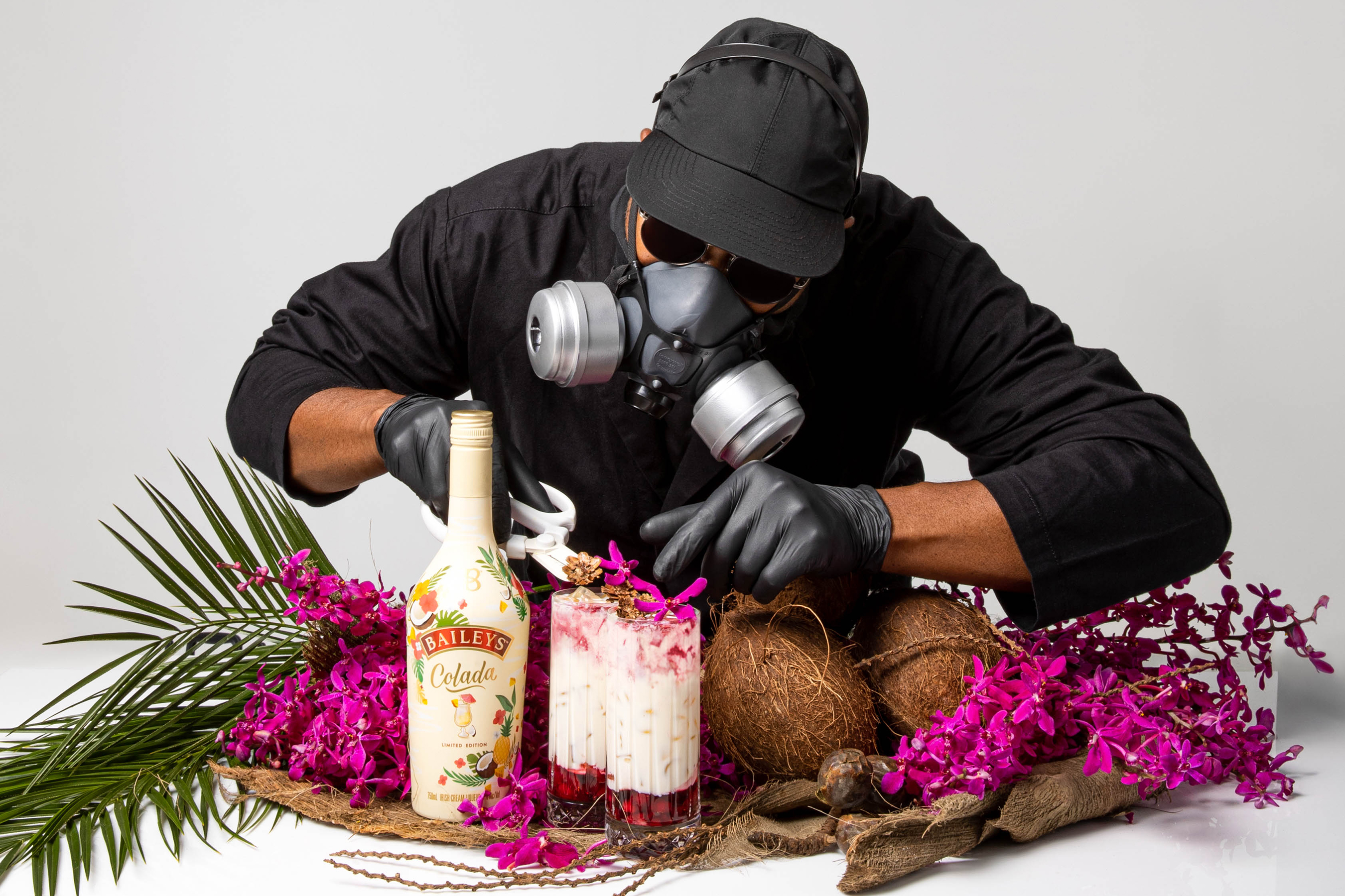 Mr. Flower Fantastic pairs the Coquito Colada with a coconut and orchid floral garnish