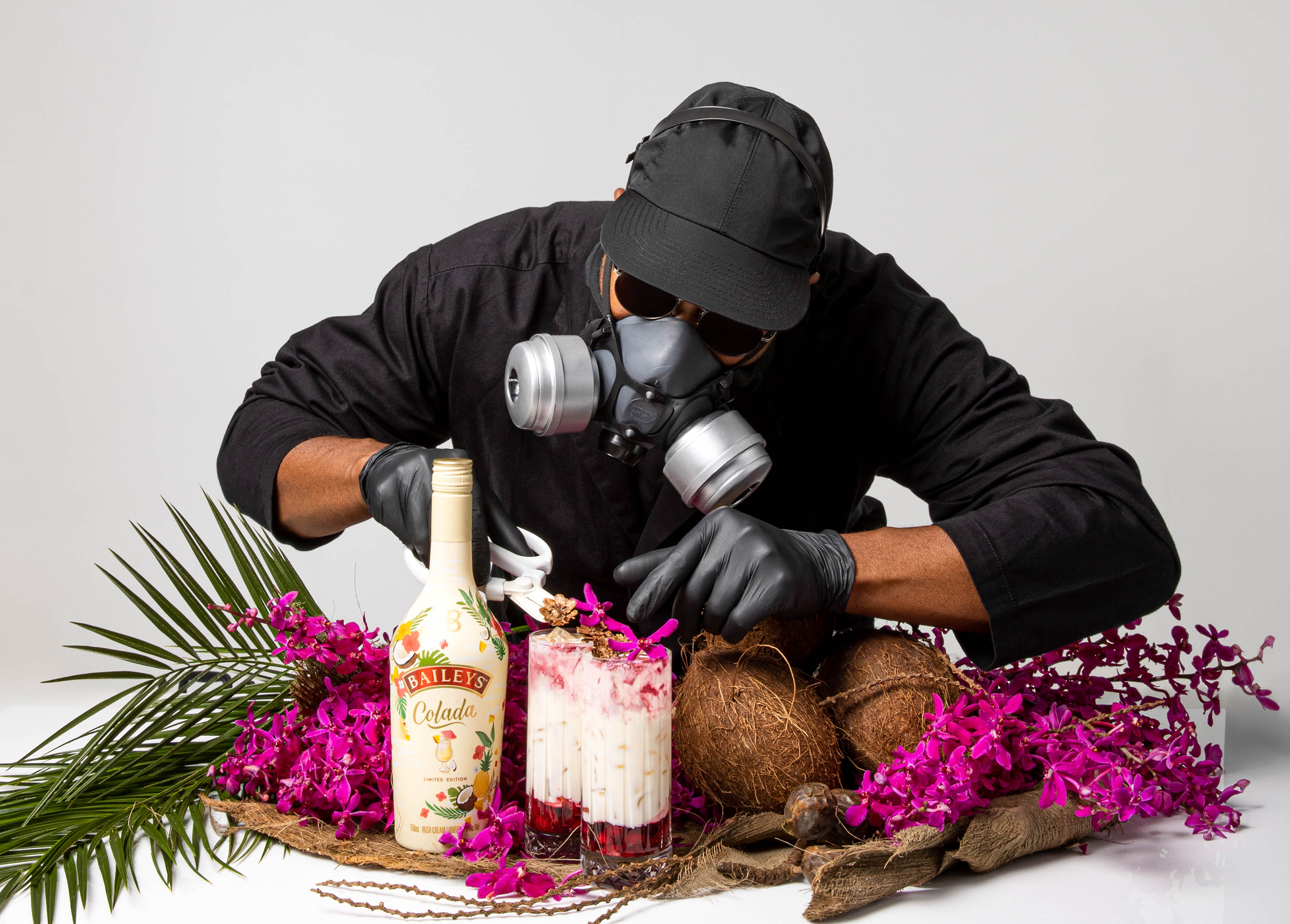 Mr. Flower Fantastic pairs the Coquito Colada with a coconut and orchid floral garnish