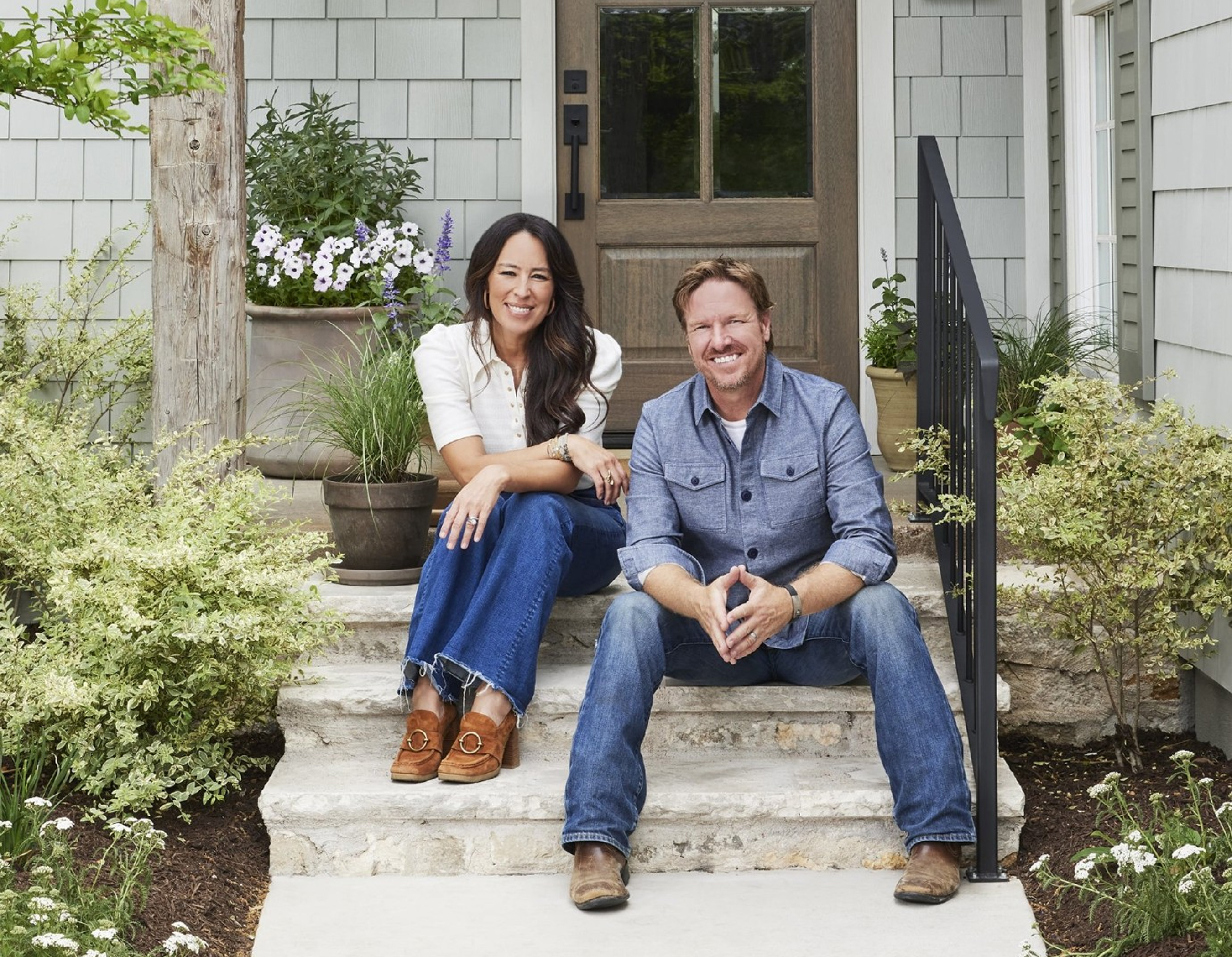 Chip and Joanna Gaines at the Minty Green home from HGTV’s Fixer Upper, featuring Hardie® Shingle from the Magnolia Home | James Hardie Collection.