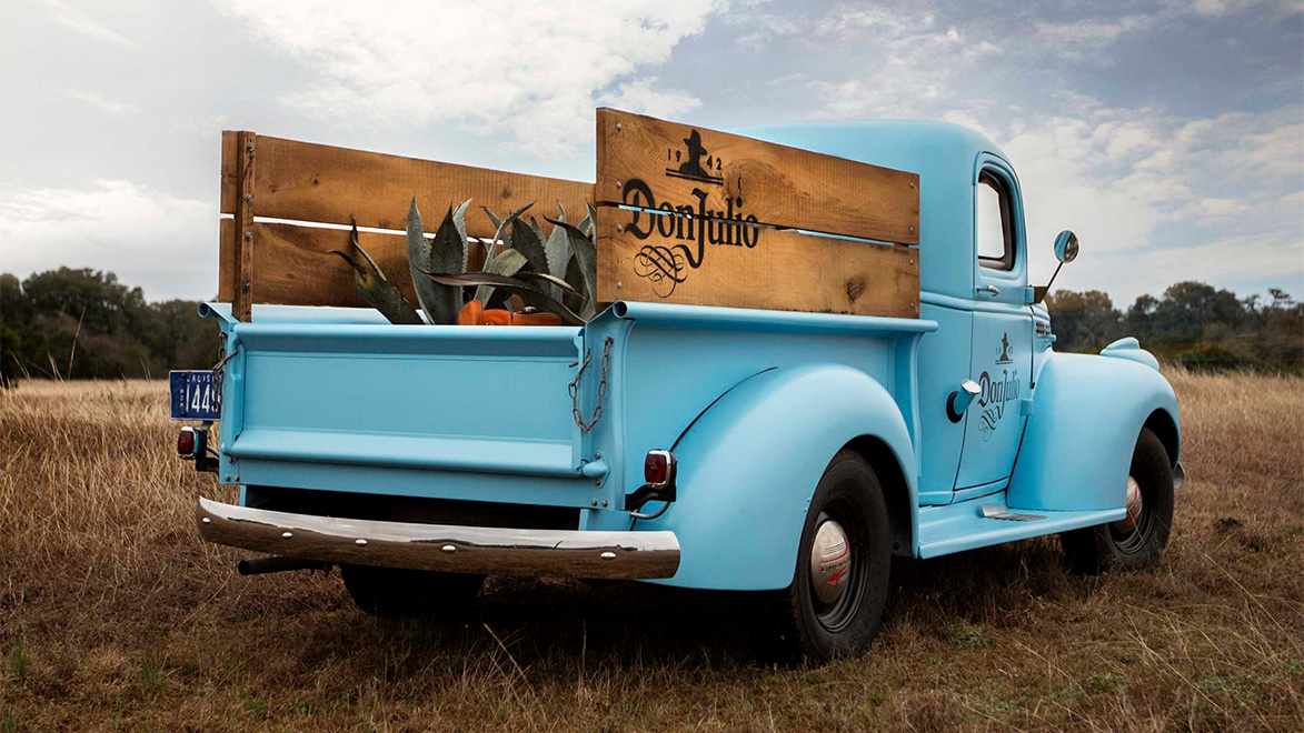 Blue truck in a field
