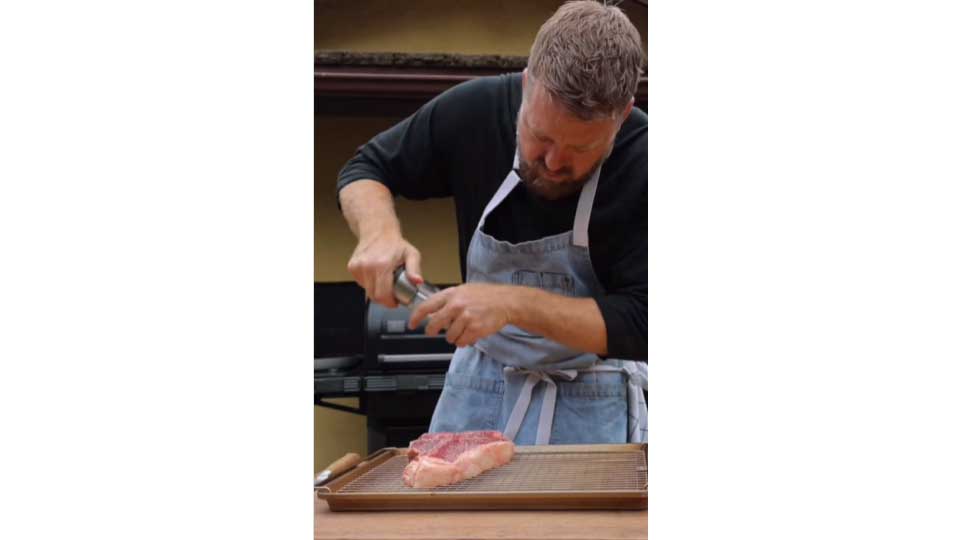 Chef Tim Hollingsworth prepares reverse seared seaks