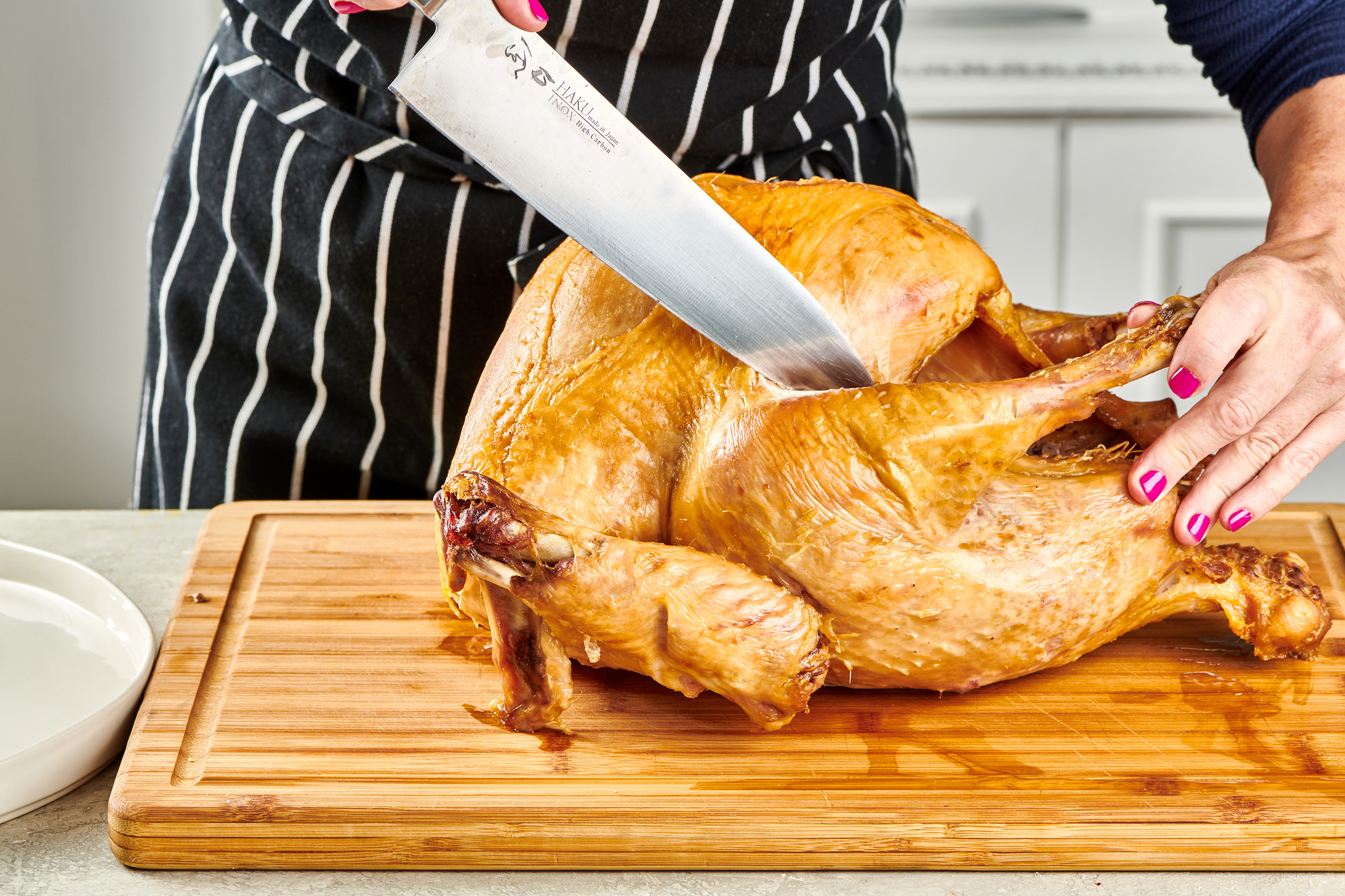 Thanksgiving 101 has a fool-proof, step-by-step process on how to carve a turkey.
