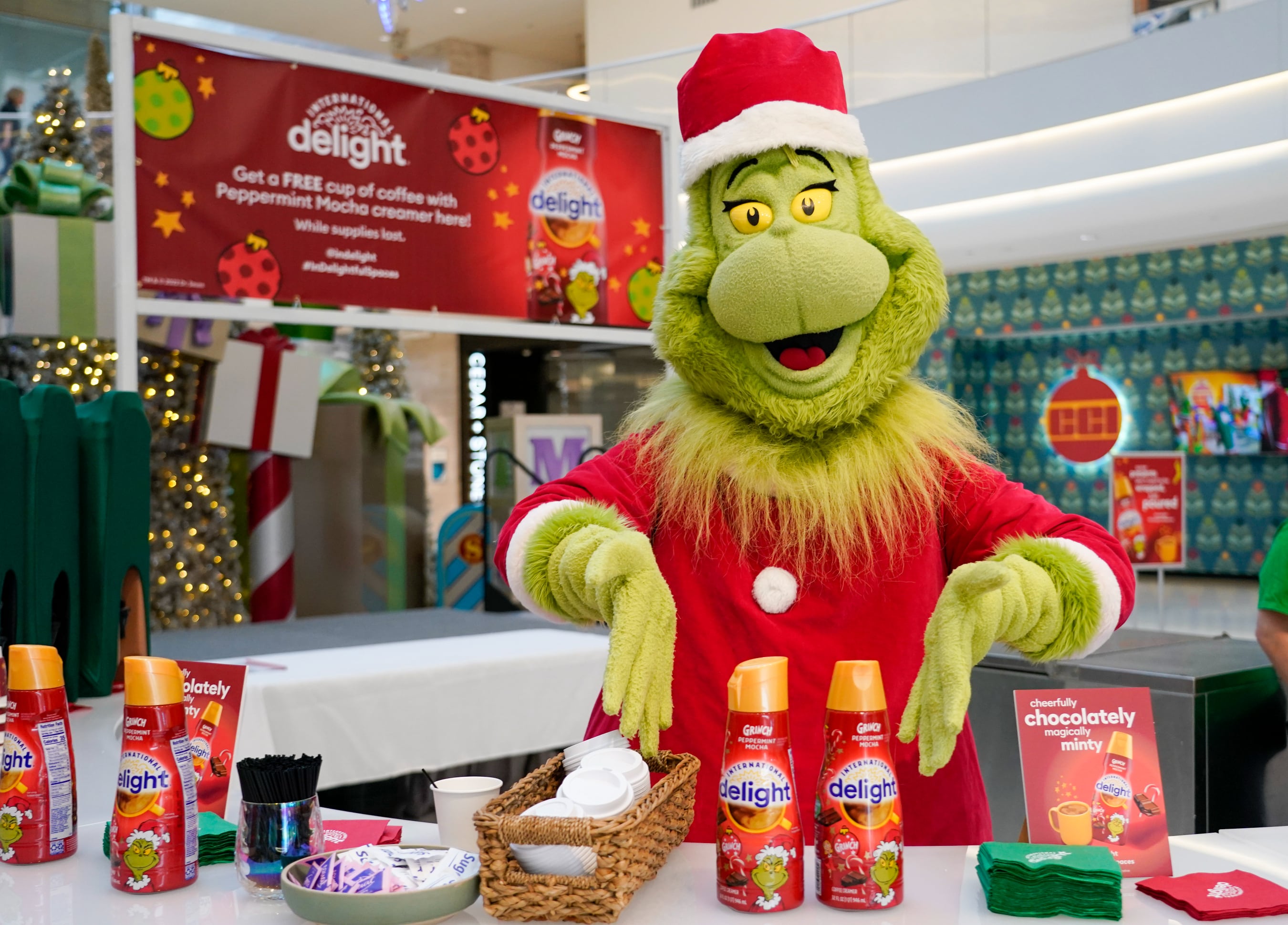 The Grinch serves up free coffee with International Delight Grinch Peppermint Mocha creamer at Mall of America
