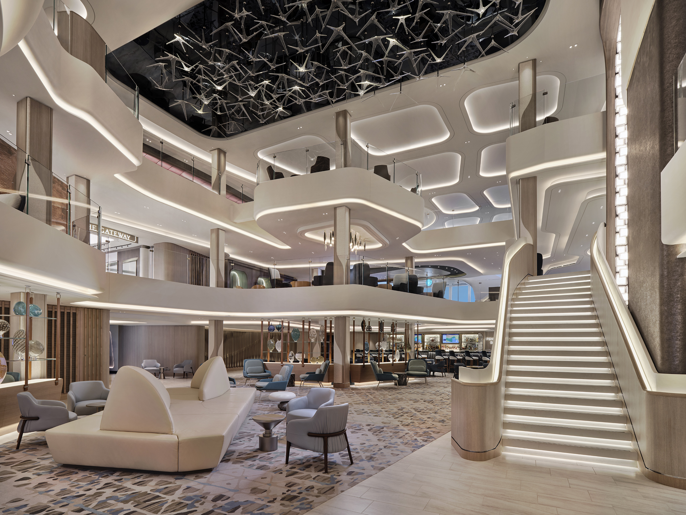Norwegian Viva’s three-story atrium is anchored by a custom mural and a stunning chandelier reminiscent of stars in the night’s sky, making for an upscale and unforgettable first impression for embarking guests.