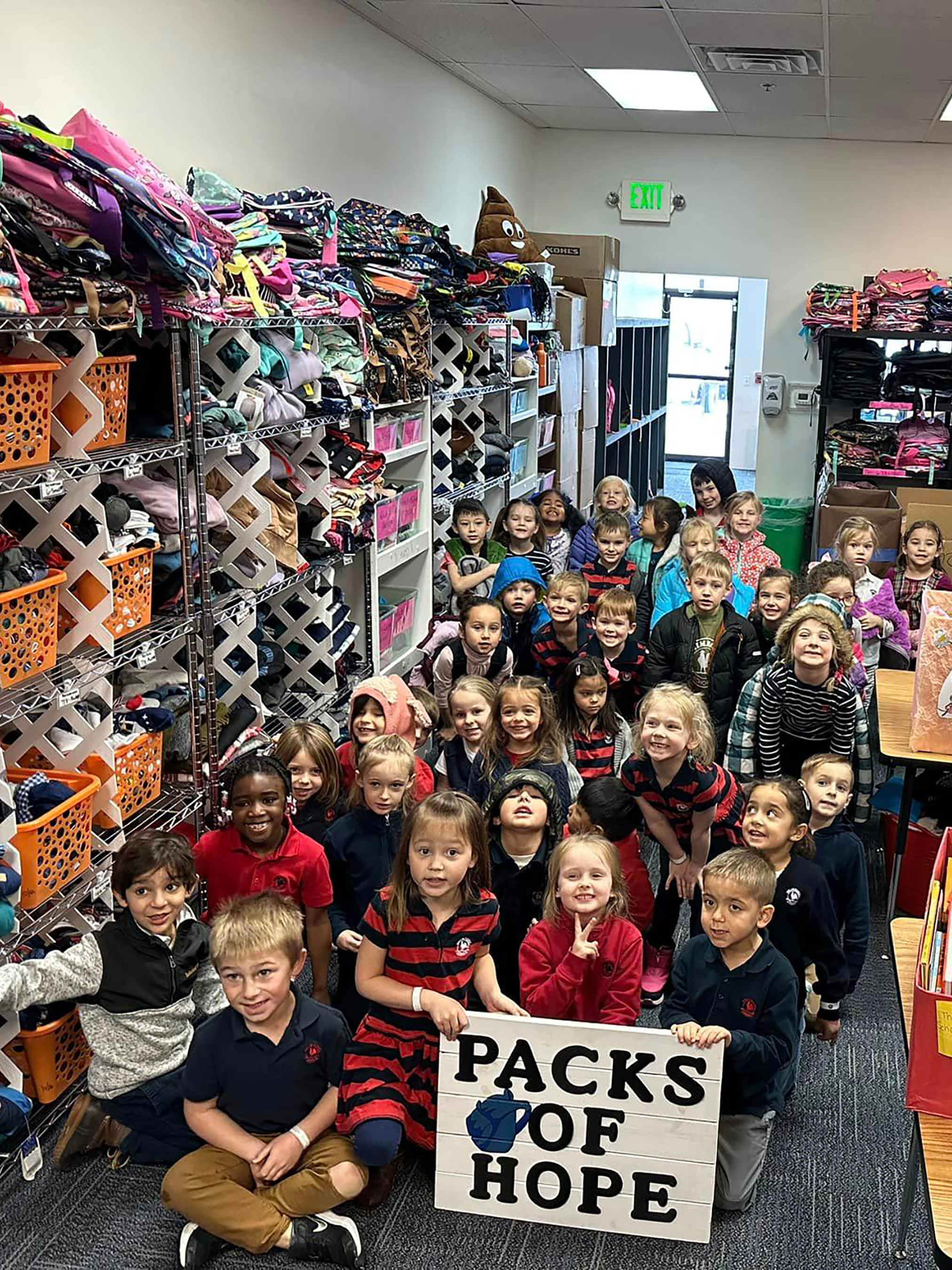 Students from Primrose School of Standley Lake (Westminster, CO) and Primrose School at Reunion (Commerce City, CO) drop off over 1,100 books to Packs of Hope.