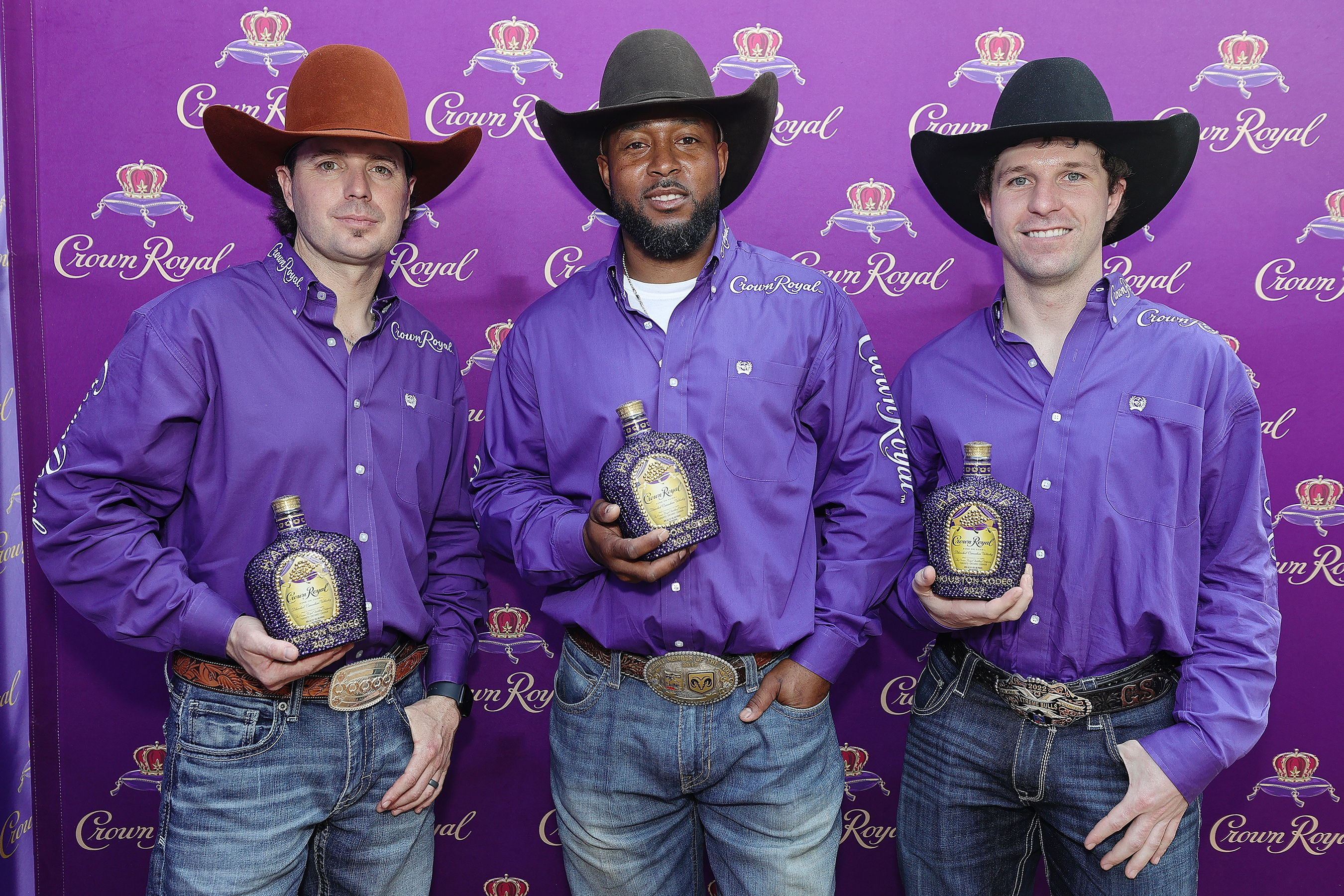 Wesley Silcox, Tory Johnson and Garrett Smith are awarded the Crown Royal "Royal Rider" award at the Houston Rodeo at NRG Park in Houston, Texas. (Photo by Bob Levey/Getty Images for Crown Royal)