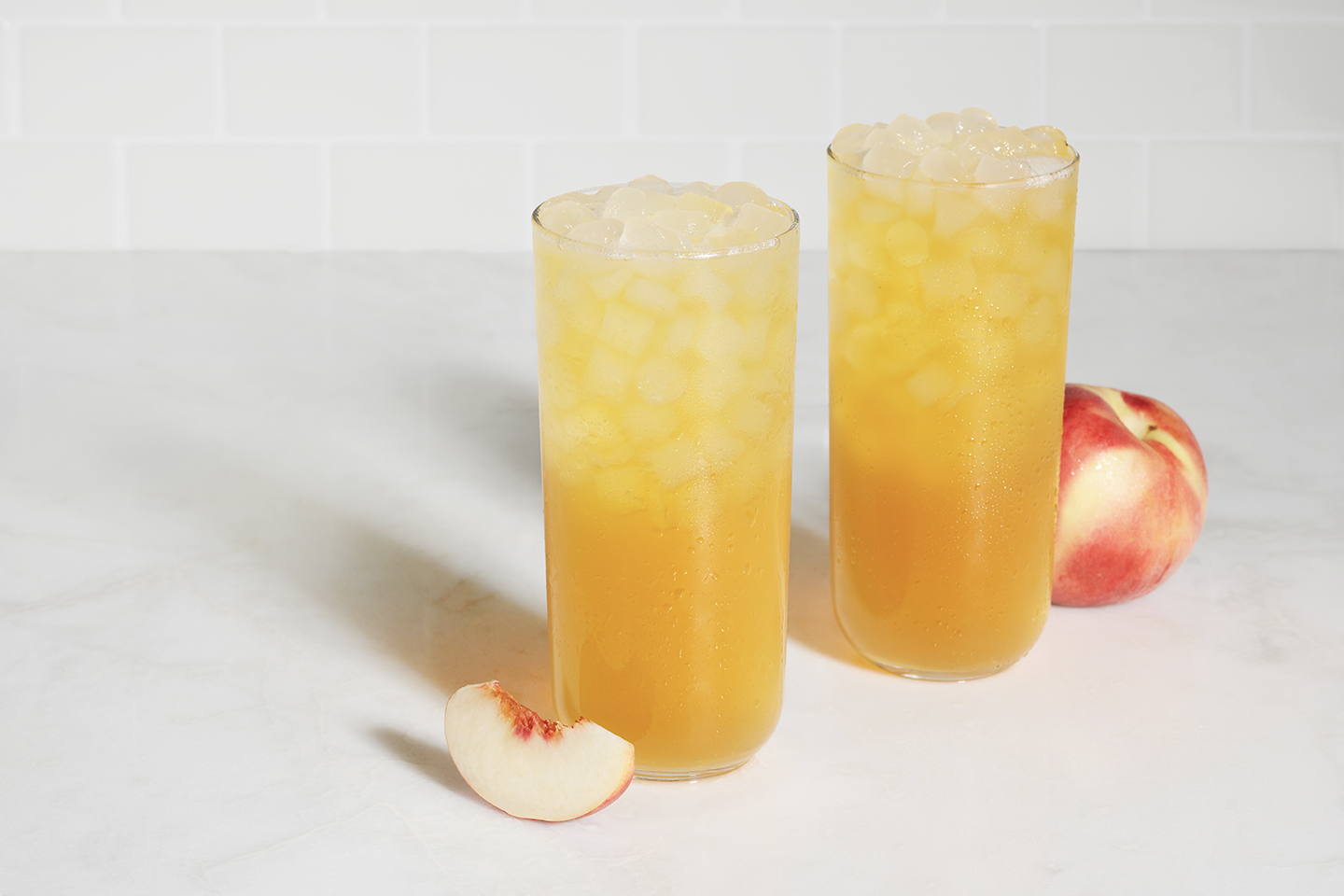 The White Peach Sunjoy ® is a refreshing combination of Chick-fil-A’s Sunjoy® beverage, blending our classic Lemonade and freshly-brewedSweetened Iced Tea, with white peach flavors.