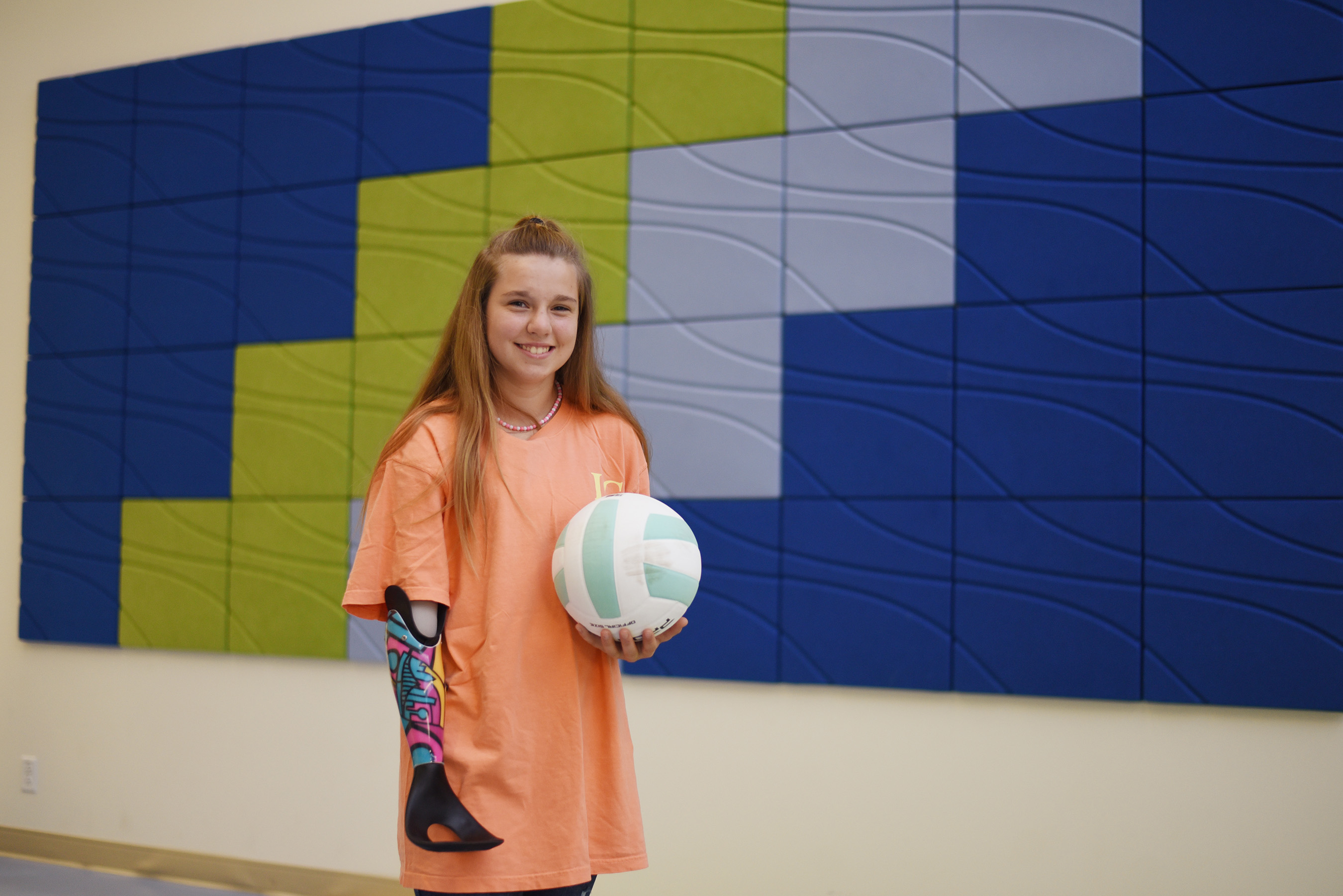 Scottish Rite for Children patient Shaleigh with her volleyball prosthetic from the By Way of Dallas collaboration.