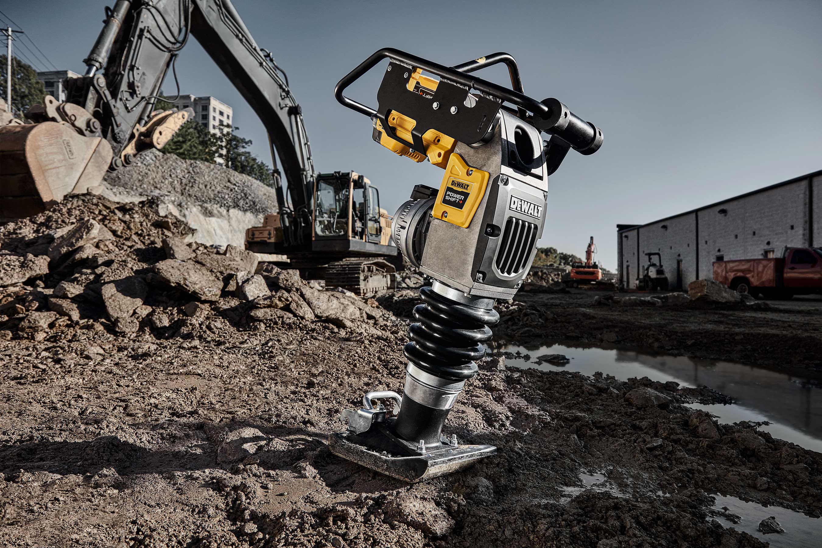 The DEWALT POWERSHIFT™ Rammer features 2,660 ft. lbs. of impact force with antivibration insulators and mounted controls on the ergonomic two-position handle.