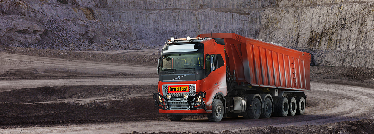 Image of red truck - Volvo Trucks has signed a landmark agreement with Brønnøy Kalk AS to provide its first commercial autonomous transport solution.