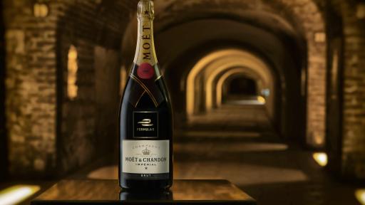 A bottle of Moët & Chandon champagne featuring the Formula E logo in the Maison’s legendary cellars below the streets of Epernay, France.