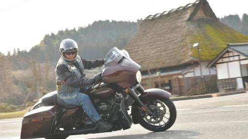 Image of man on Motorbike - Shirakawa-go – experience the fascination of the wind and the fragrant smells when riding a motorbike through this World Heritage Site village