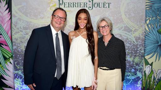 Image of Cesar Giron and his wife with Winnie Harlow at HyperNature by Perrier-Jouët