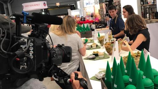 Image of CNBC channel at the 'Have an Olive Day' stand.