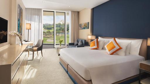 Panoramic vistas of the lake and lush greenery from the Resort Course View Room