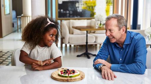 Image of Jumeirah FoodieKiDS - Chief Culinary Officer Michael Ellis with one of the little foodies who helped shape the menu