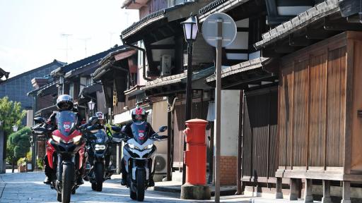 Image of Kanayamachi – the motorbikes arrive in the town paved with stone throughout that oozes a unique atmosphere.
