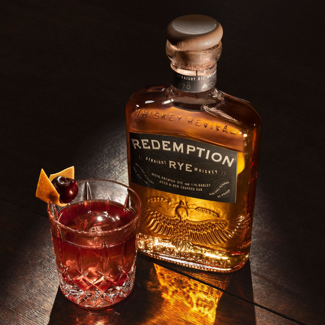 Redemption Whiskey’s Straight Rye Bottle and Black Cherry Old Fashioned Cocktail